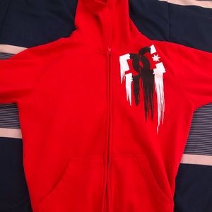 all red zip up jacket